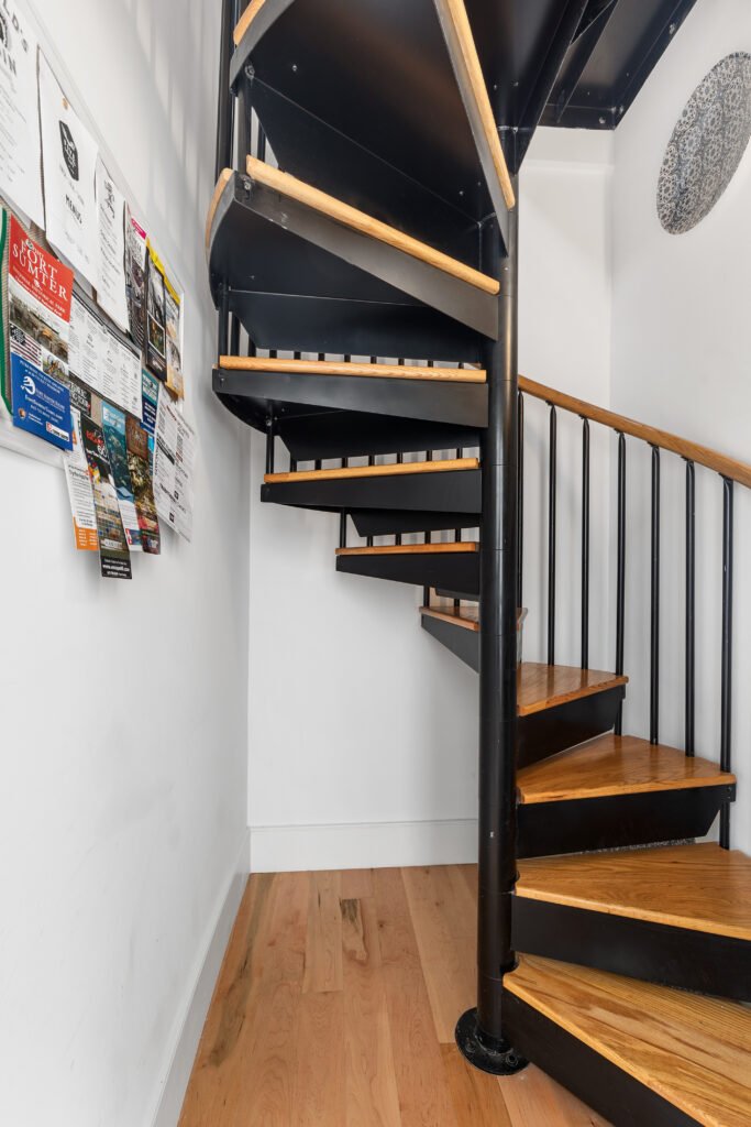 Stylish stairway inside Charleston luxury private suites